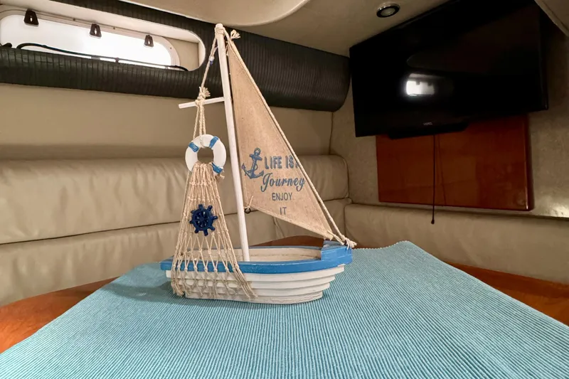 40 Formula Pc Yacht Photos Pics Decorative sailboat model inside 2006 Formula 40 PC cabin, featuring nautical theme.