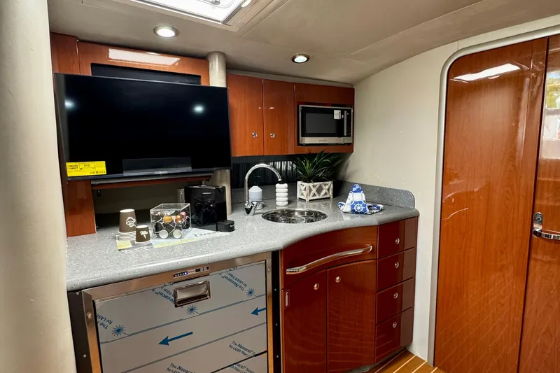 40 Formula Pc Yacht Photos Pics Luxurious 2006 Formula 40 PC yacht interior with kitchenette, TV, and modern amenities.