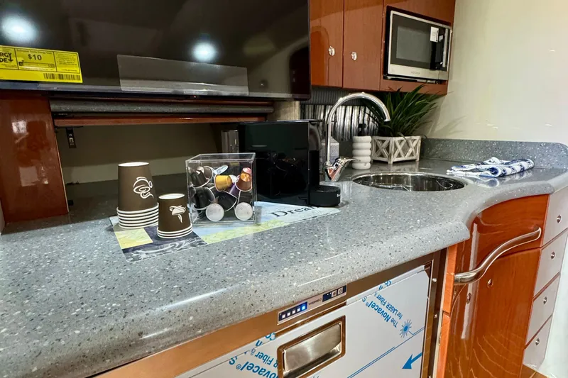 40 Formula Pc Yacht Photos Pics Modern kitchenette in 2006 Formula 40 PC yacht with coffee maker and microwave.