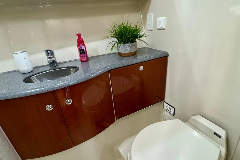 40 Formula Pc Yacht Photos Pics Luxurious 2006 Formula 40 PC yacht bathroom with modern sink, toilet, and stylish decor.