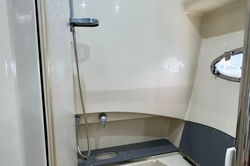 40 Formula Pc Yacht Photos Pics 2006 Formula 40 PC yacht bathroom with shower and porthole window.