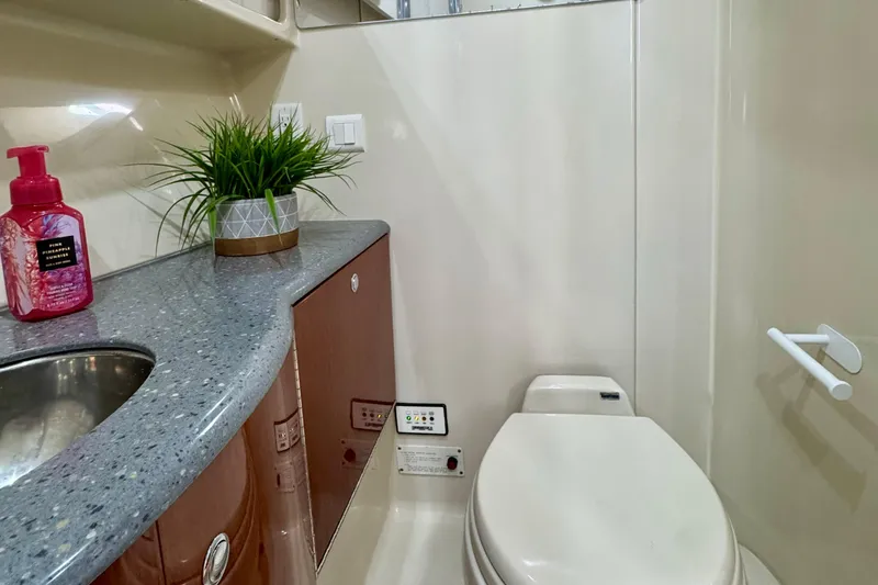 40 Formula Pc Yacht Photos Pics Luxurious bathroom in 2006 Formula 40 PC yacht with modern fixtures and decor.