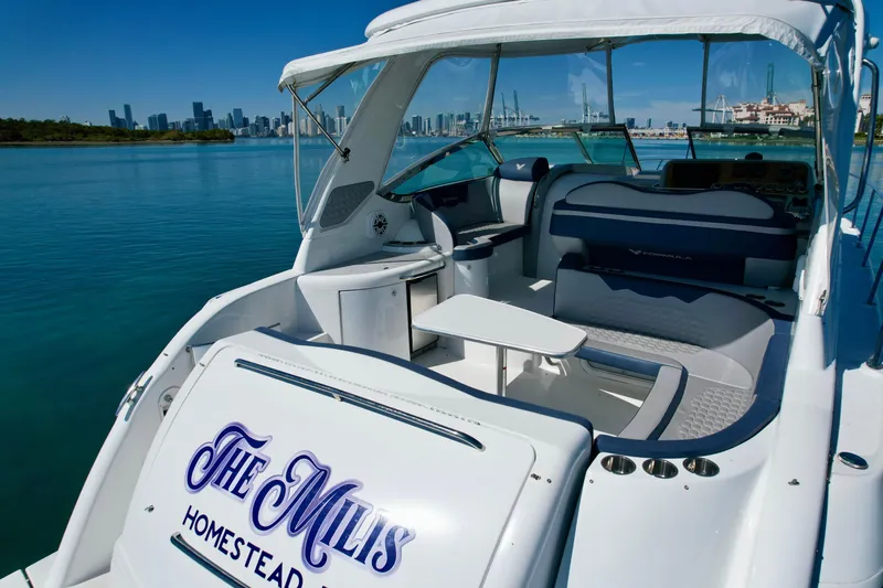 40 Formula Pc Yacht Photos Pics 2006 Formula 40 PC yacht with luxurious seating, docked near a city skyline.