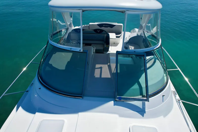 40 Formula Pc Yacht Photos Pics 2006 Formula 40 PC yacht with open cockpit, cruising on clear blue water.