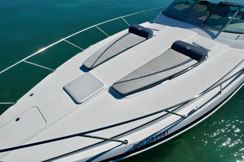 40 Formula Pc Yacht Photos Pics 2006 Formula 40 PC yacht with sun pads on deck, floating on clear water.