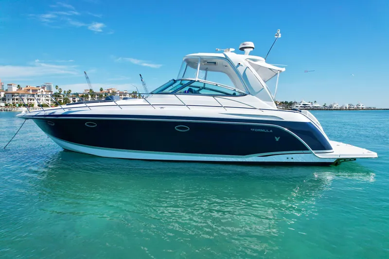 40 Formula Pc Yacht Photos Pics 2006 Formula 40 PC yacht on clear blue water under a sunny sky.