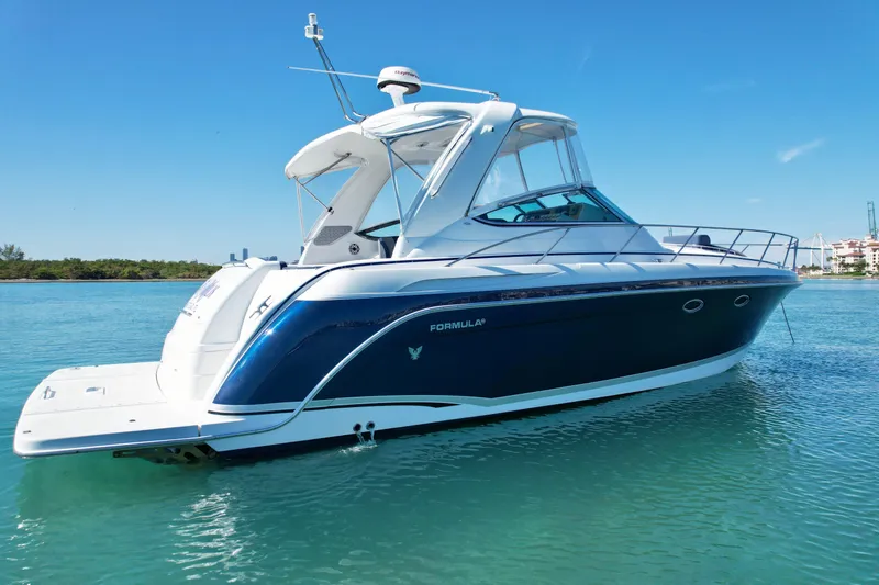 40 Formula Pc Yacht Photos Pics 2006 Formula 40 PC yacht on clear blue water under a sunny sky.