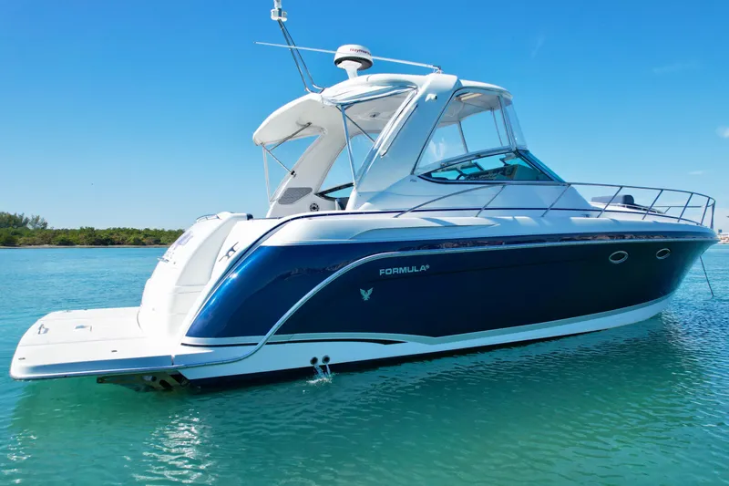 40 Formula Pc Yacht Photos Pics 2006 Formula 40 PC yacht on clear blue water under a sunny sky.