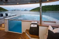 Sundeck Jacuzzi With Swim-Up Bar Looking Forward