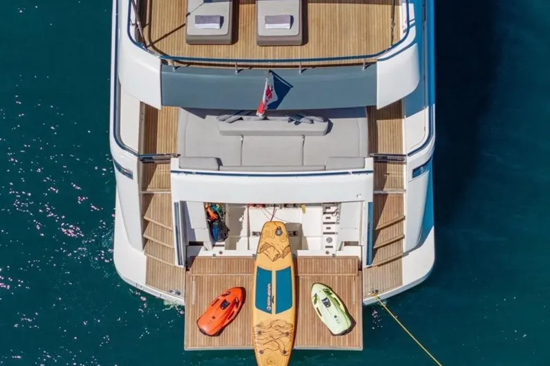  Yacht Photos Pics Aerial view of 2018 Ferretti Yachts 850 with paddleboards and kayaks on deck.