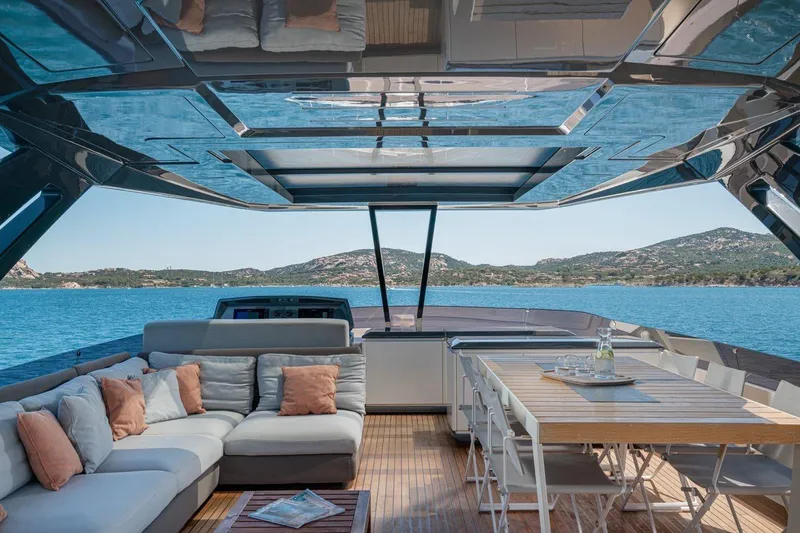  Yacht Photos Pics Luxurious 2018 Ferretti Yachts 850 interior with elegant seating and dining area, ocean view.
