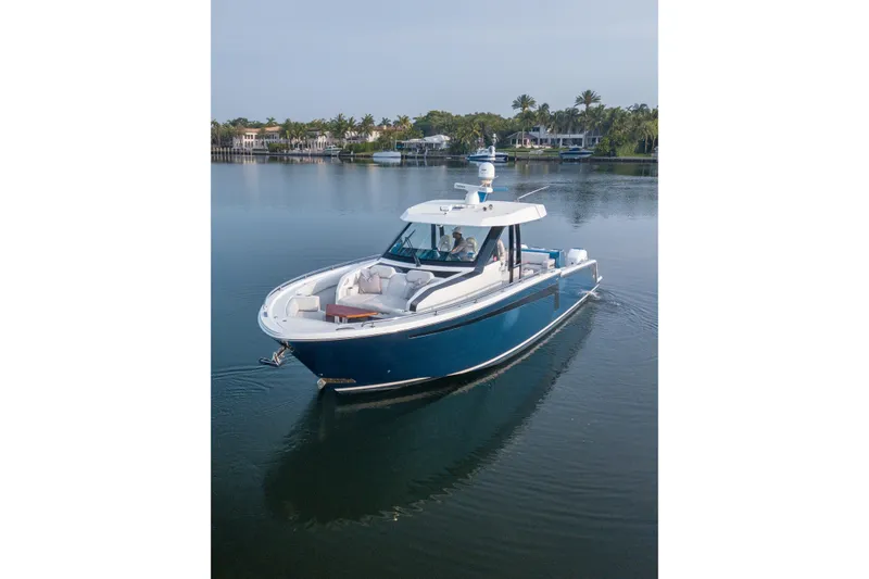 Low Hours Yacht Photos Pics 2020 Ocean Alexander 45 Divergence Sport yacht cruising on calm waters.