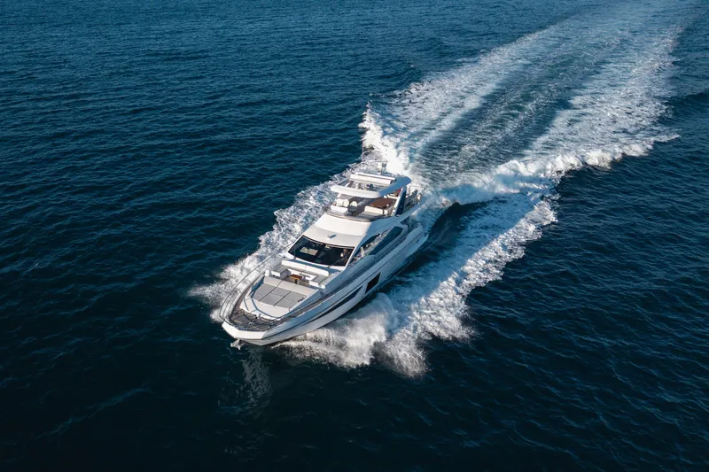  Yacht Photos Pics Azimut 72 Flybridge 2023 yacht cruising on open water, aerial view.