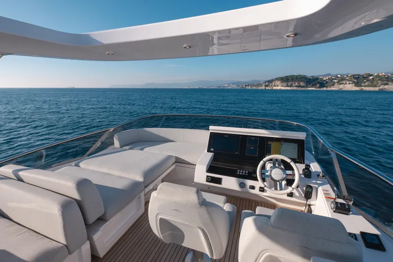 Yacht Photos Pics 2023 Azimut 72 Flybridge yacht interior with ocean view and modern helm.
