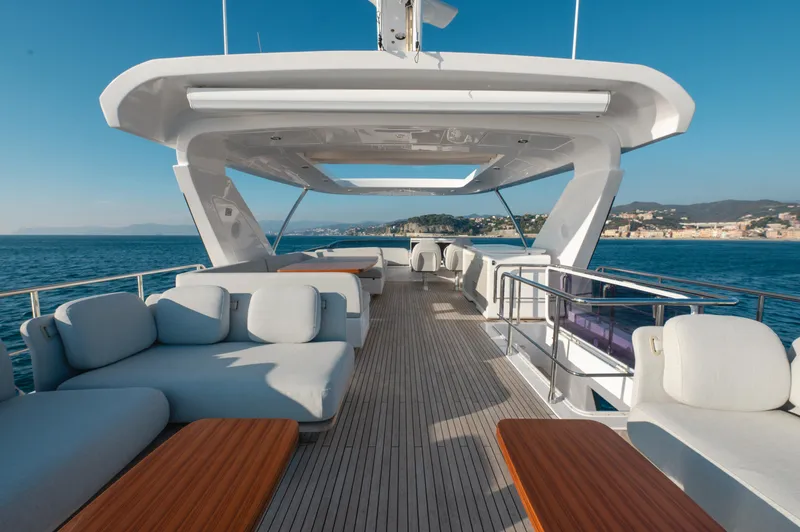  Yacht Photos Pics Luxurious 2023 Azimut 72 Flybridge yacht with spacious deck and elegant seating.