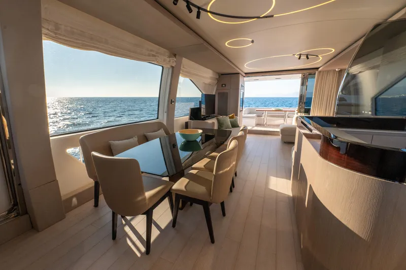  Yacht Photos Pics Luxurious interior of 2023 Azimut 72 Flybridge yacht with ocean view.
