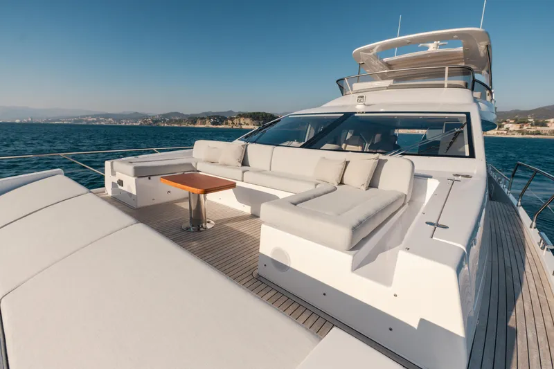  Yacht Photos Pics Luxurious 2023 Azimut 72 Flybridge yacht with spacious deck and elegant seating.