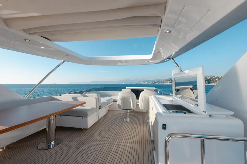  Yacht Photos Pics Luxurious 2023 Azimut 72 Flybridge yacht with spacious deck and ocean view.
