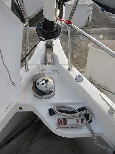  Yacht Photos Pics 2024 Jeanneau Sun Odyssey 410 sailboat deck with winch and control panel.