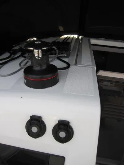  Yacht Photos Pics 2024 Jeanneau Sun Odyssey 410 deck with winch and cleats.