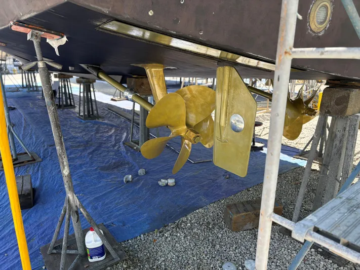  Yacht Photos Pics Propeller and rudder of a 2000 Buddy Davis 78 yacht on dry dock.