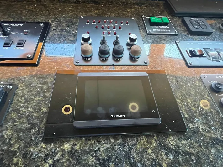  Yacht Photos Pics Control panel of a 2000 Buddy Davis 78 yacht with Garmin display and various switches.