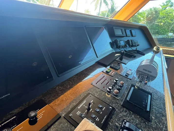  Yacht Photos Pics Control panel of a 2000 Buddy Davis 78 yacht with navigation equipment and controls.