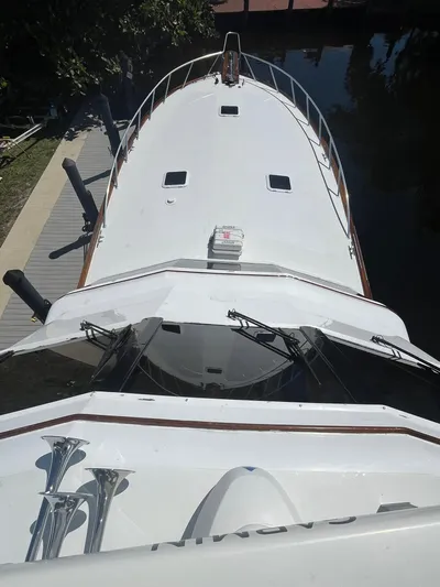  Yacht Photos Pics Bow view of 2000 Buddy Davis 78 yacht docked at marina.