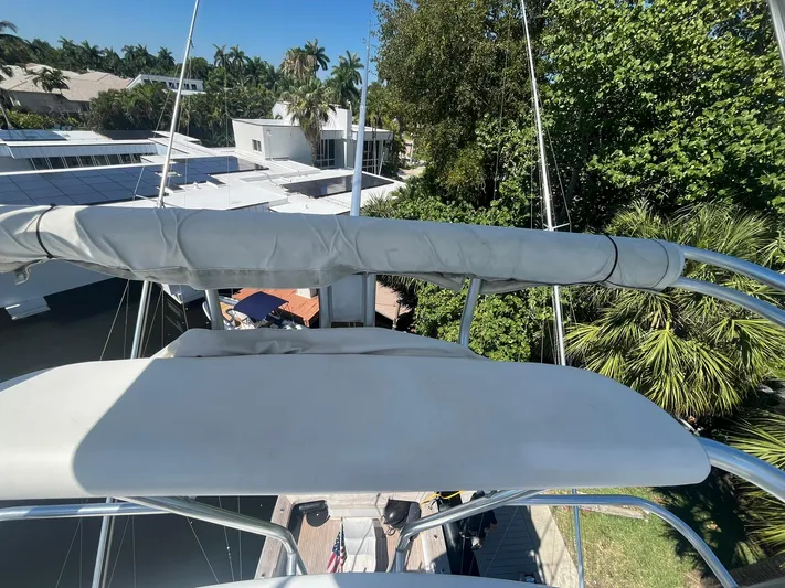  Yacht Photos Pics View from Buddy Davis 78 yacht, overlooking lush greenery and waterfront homes.