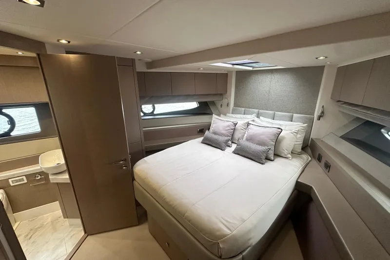  Yacht Photos Pics Luxurious bedroom interior of 2018 Sunseeker Manhattan 52 yacht with modern design.