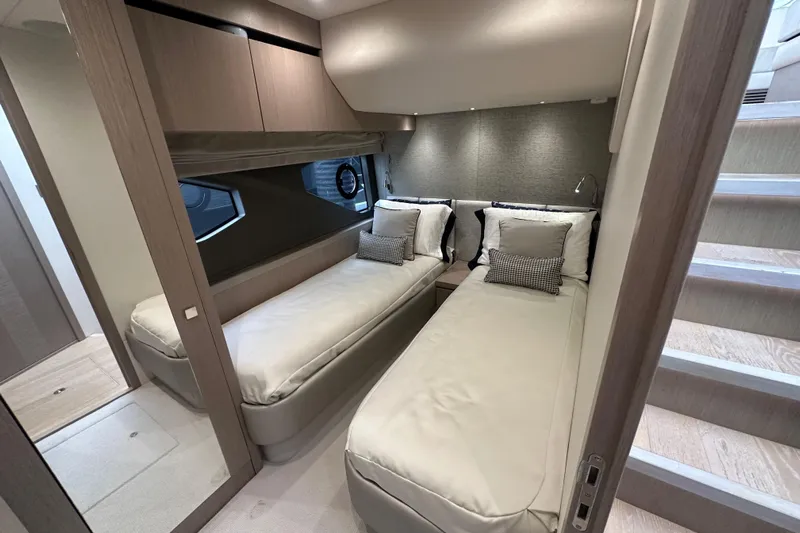 Yacht Photos Pics Luxurious twin cabin interior of 2018 Sunseeker Manhattan 52 yacht.