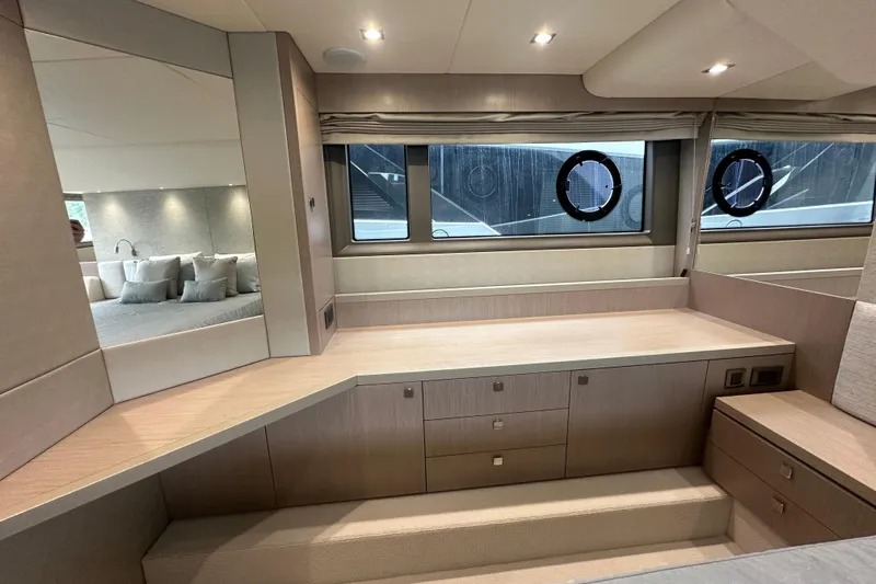  Yacht Photos Pics Luxurious interior of 2018 Sunseeker Manhattan 52 yacht with modern furnishings and ample storage.