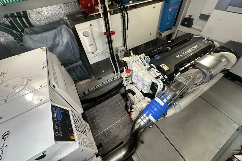 Yacht Photos Pics Engine room of 2018 Sunseeker Manhattan 52 yacht with Volvo Penta engine and Cummins Onan generator.
