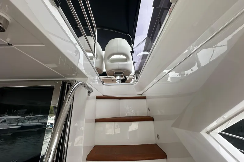  Yacht Photos Pics Staircase leading to upper deck of 2018 Sunseeker Manhattan 52 yacht.