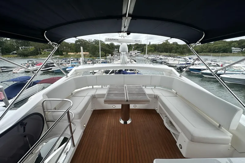 Yacht Photos Pics Luxurious 2018 Sunseeker Manhattan 52 yacht with spacious deck and elegant seating area.