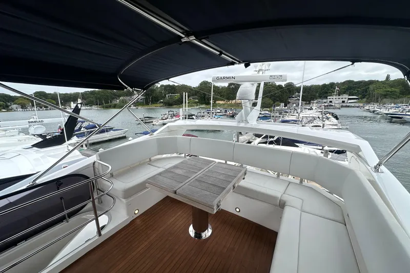  Yacht Photos Pics Flybridge view of 2018 Sunseeker Manhattan 52 yacht docked at marina.