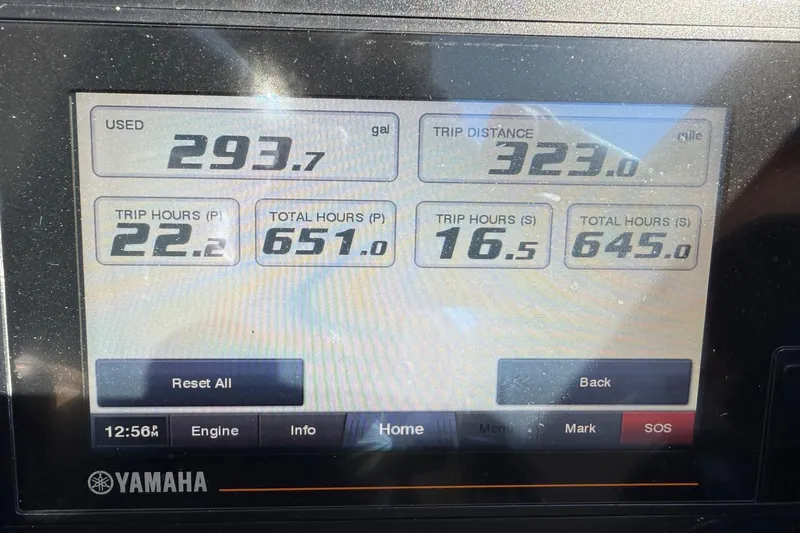  Yacht Photos Pics Display screen of 2020 Pursuit OS 325 Offshore showing fuel usage and trip data.