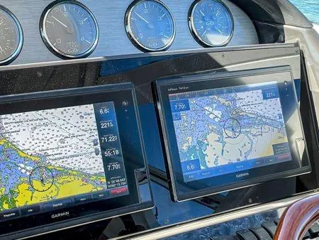Lazy Gray Yacht Photos Pics Dashboard of a 2008 Sea Ray 40 Motor Yacht with Garmin navigation displays.