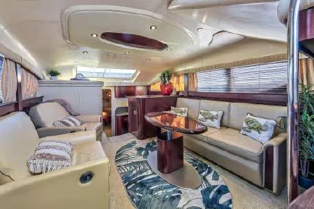 Lazy Gray Yacht Photos Pics Luxurious interior of 2008 Sea Ray 40 Motor Yacht with elegant seating and decor.
