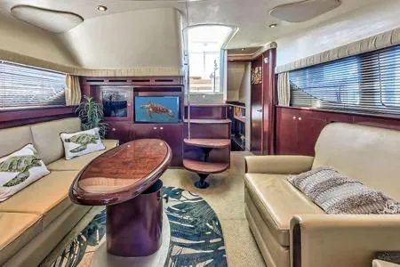 Lazy Gray Yacht Photos Pics Luxurious interior of 2008 Sea Ray 40 Motor Yacht with elegant seating and wooden accents.