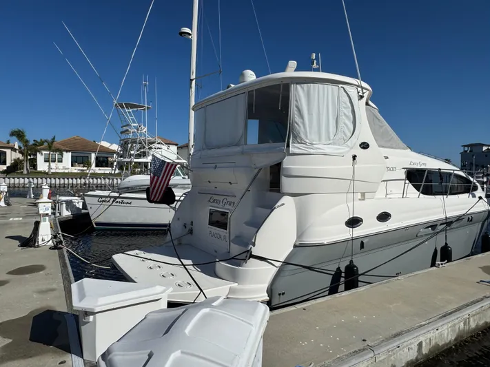 Lazy Gray Yacht Photos Pics 2008 Sea Ray 40 Motor Yacht docked at marina under clear blue sky.