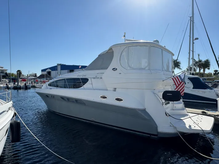 Lazy Gray Yacht Photos Pics 2008 Sea Ray 40 Motor Yacht docked in a sunny marina.