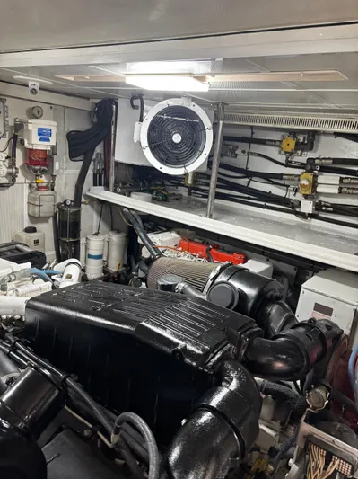 Arlene Yacht Photos Pics Engine room of 2009 Horizon Vision 74 yacht, featuring machinery and ventilation system.