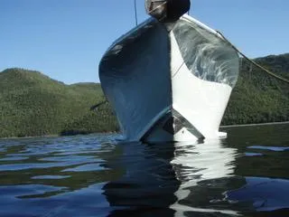  Yacht Photos Pics Front view of a 2010 Mission-Craft Mis 35 boat on calm water.