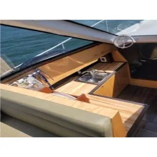  Yacht Photos Pics Interior of 2010 Mission-Craft Mis 35 boat with wooden cabinetry and seating.