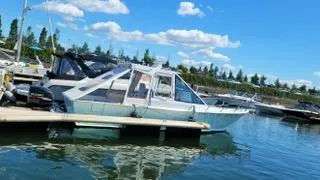  Yacht Photos Pics Boat docked at marina, Mission-Craft Mis 35, 2010 model, under clear blue sky.