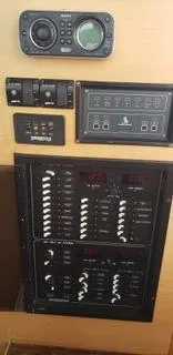  Yacht Photos Pics Control panel of a 2010 Mission-Craft Mis 35 boat with various switches and displays.