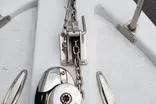  Yacht Photos Pics Close-up of a 2010 Mission-Craft Mis 35 boat's anchor chain and winch system.