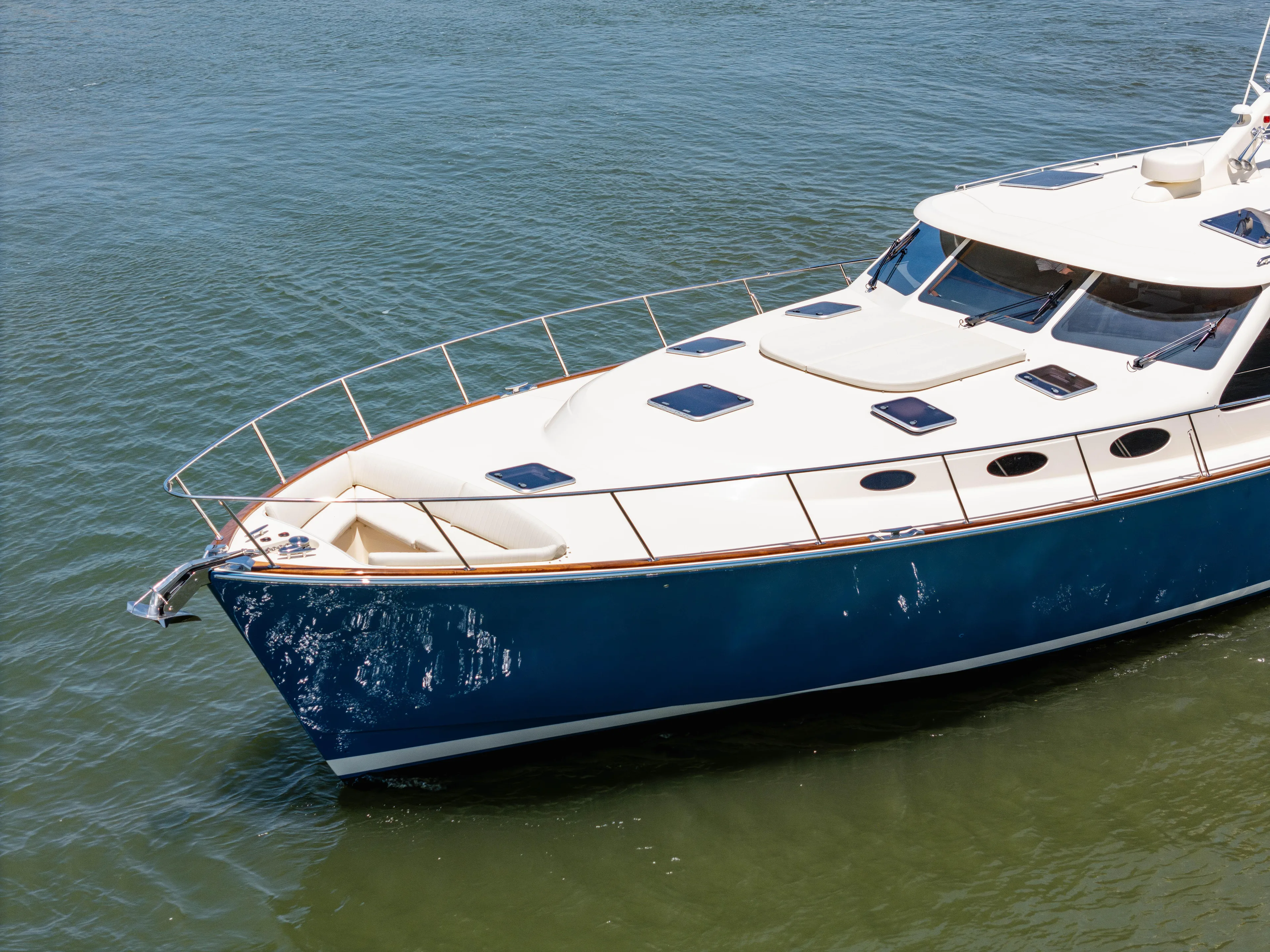 Margin Yacht Photos Pics 2025 Palm Beach Motor Yachts PB70 on water, showcasing sleek design and luxury features.