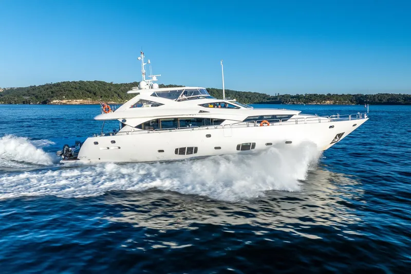 2010 Sunseeker Mega Yacht Yacht Photos Pics Luxurious 2010 Sunseeker 30M yacht cruising on clear blue waters.